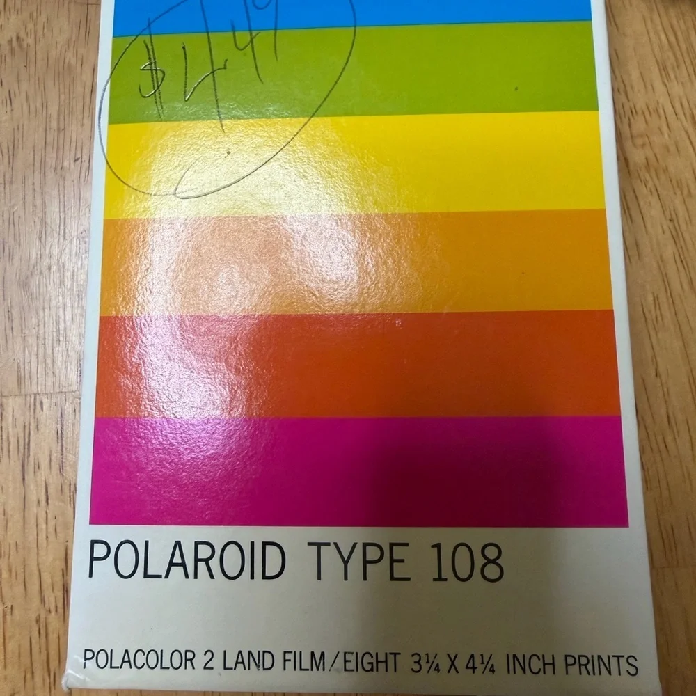 Vintage Polaroid Automatic 100 Land Camera in good overall condition, offered as